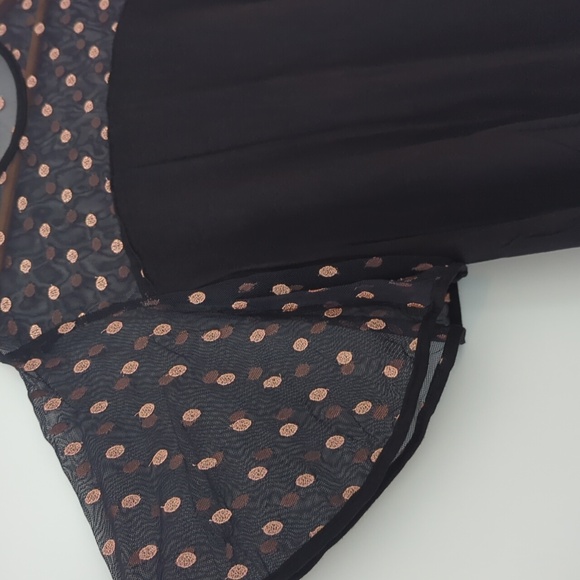 Flowing flirty top with sheer neckline and shoulders - Picture 2 of 2